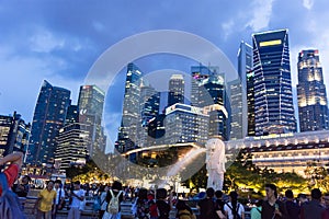 Tourists at the Singapore Merlion Park and Night Cityscape photo