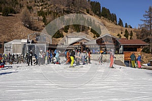 Tourists skiing at ski resort during vacation