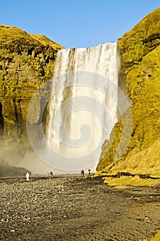 Tourists at Skogafoss waterfall Iceland