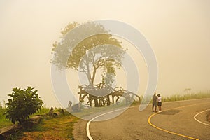 Tourists standing in viewpoint of phulankha National Park