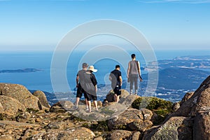 Tourists at the stunning summit of Mount Wellington overlooking Hobart and the south coast