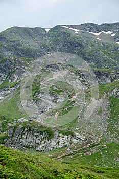 Tourists in summer mountains