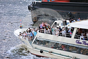 Tourists take on a ferry for sightseeing