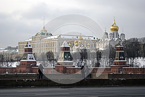 Tourists take pictures of Moscow Kremlin. UNESCO World Heritage Site.