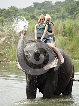 Tourists taking Elephant bath