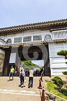Tourists taking photos at the main entrance from Himeji castle