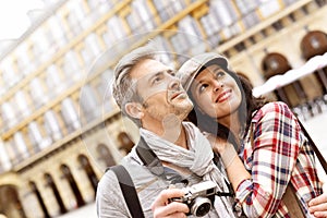 Tourists taking pictures on site