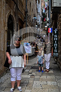 Tourists in Tipical little street in old town of Dubrovnik ,Croatia