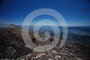 Tourists on top of volcano