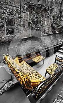 Tourists travel on gondolas at canal