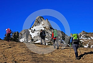 Tourists trekking in the Ciucas mountains, Romania