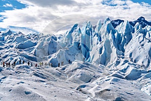 Tourists Trekking on Perito Moreno Glacier, Patagonia, Argentina, South America