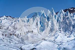 Tourists Trekking on Perito Moreno Glacier, Patagonia Argentina, South America