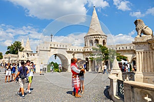 Tourists on the Trinity Square near Fisherman`s Bastion in Budapest, Hungary