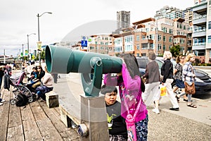 Tourists using telescope
