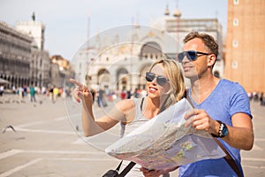 Tourists in Venice looking for directions