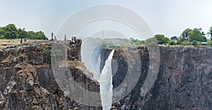 Tourists at Victoria Falls, Zimbabwe, Zambia, Africa