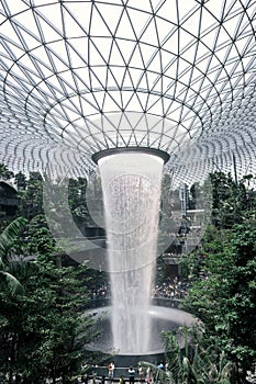 Tourists visit The HSBC Rain Vortex