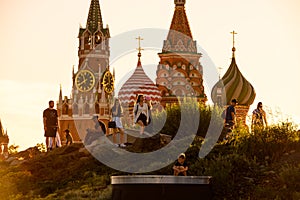 Tourists visit landscaped Zaryadye Park in summer, Moscow, Russia. Focus on people