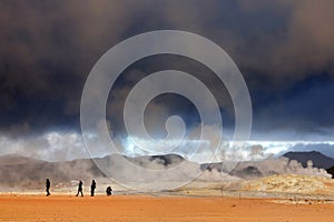 Tourists visiting the Geothermal region of Hverir near Myvatn Lake in Iceland.