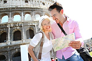 Tourists visiting Rome with help of map