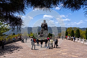 Tourists visiting statue of Marshall He Long. 10 Marshalls of the Peop