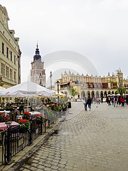 Tourists visiting Town Hall Tower and Rynek Glowny Square