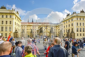 Tourists wait outside the courtyard of the Royal Palace for the changing of the guard at Prague Castlle Complex in Czechia