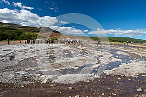 Tourists waiting for the eruption of geysir, Iceland