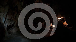 Tourists walk through caves at Bich Dong Pagoda, Tam Coc, Vietnam