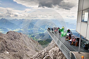 Tourists walk on Dachstein Sky Walk