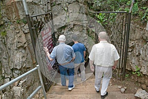 Tourists walking into cave at Cradle of Humankind, a World Heritage Site in Gauteng Province, South Africa, the site of 2.8