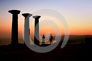 Tourists Watching The Sunset At The Athena Temple