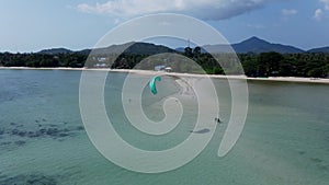 Tourists Into Watersports At The Summer Paradise In Ko Pha Ngan Island, Thailand. Aerial Drone Orbiting