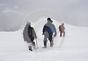 Tourists in a winter mountain