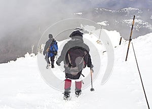 Tourists in a winter mountain