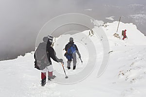 Tourists in a winter mountain