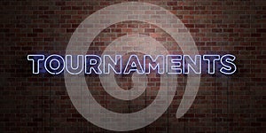 TOURNAMENTS - fluorescent Neon tube Sign on brickwork - Front view - 3D rendered royalty free stock picture photo