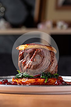 Tournedos Rossini with foie-gras. Fillet mignon steak Serving in the restauran