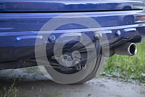 Tow bar with socket installed on a passenger car. A car prepared for cargo transportation