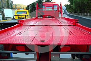 Tow car truck red rear view perspective platform