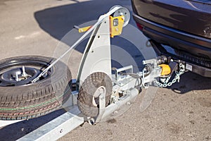 Tow hitch for towing a trailer by a passenger car