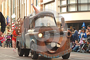 Tow-Mater from the Pixar movie Cars in a parade at Disneyland, California