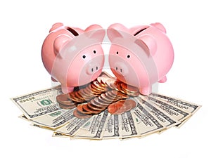 Tow Piggy Banks with Money isolated