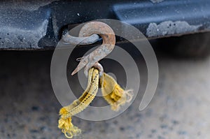 A tow rope with a hook broken during towing