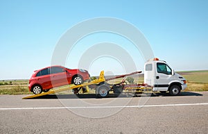 Tow truck with broken car