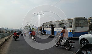 Tow truck delivers the damaged BMTC Bus, Repair and recovery vehicle towing a broken city bus