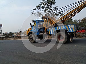 Tow truck delivers the damaged BMTC Bus, Repair and recovery vehicle towing a broken city bus