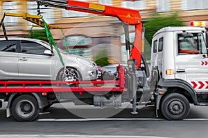 Tow truck delivers the damaged vehicle