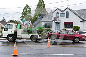 Tow truck removing car after traffic accident